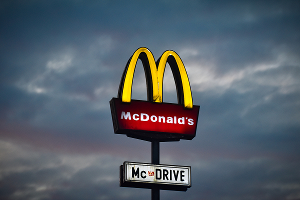 McDonalds Street sign golden arches