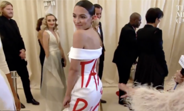 AOC Wears Tax the Rich Dress to Event for the uber wealthy