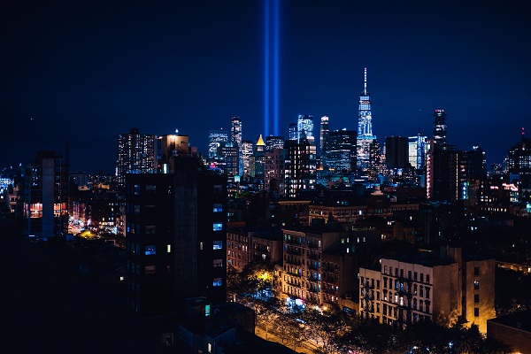 Remembering 9/11 Twin towers monument lights Photo by Matteo Catanese on Unsplash
