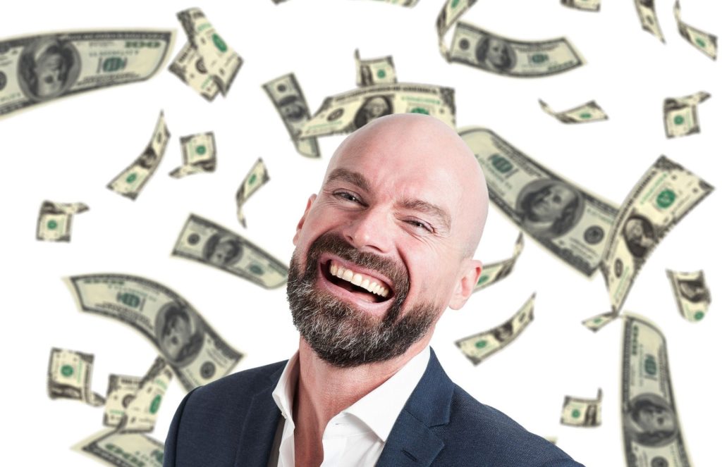 Man laughing money wealthy elite