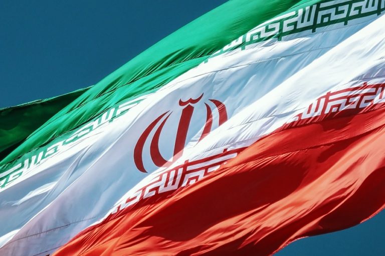 Iranian Flag Photo by sina drakhshani on Unsplash