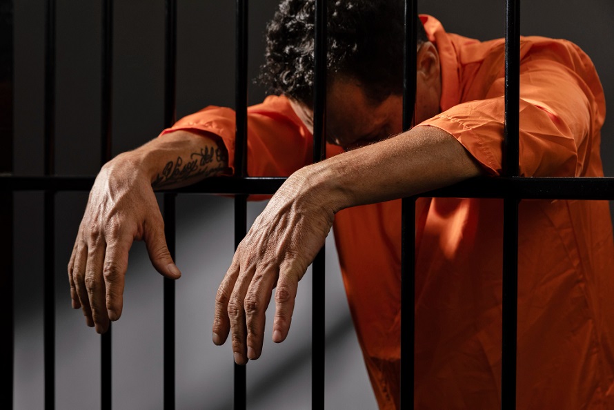 middle-aged-man-spending-time-jail FreePik
