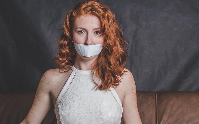 woman tape redhead silence free speech