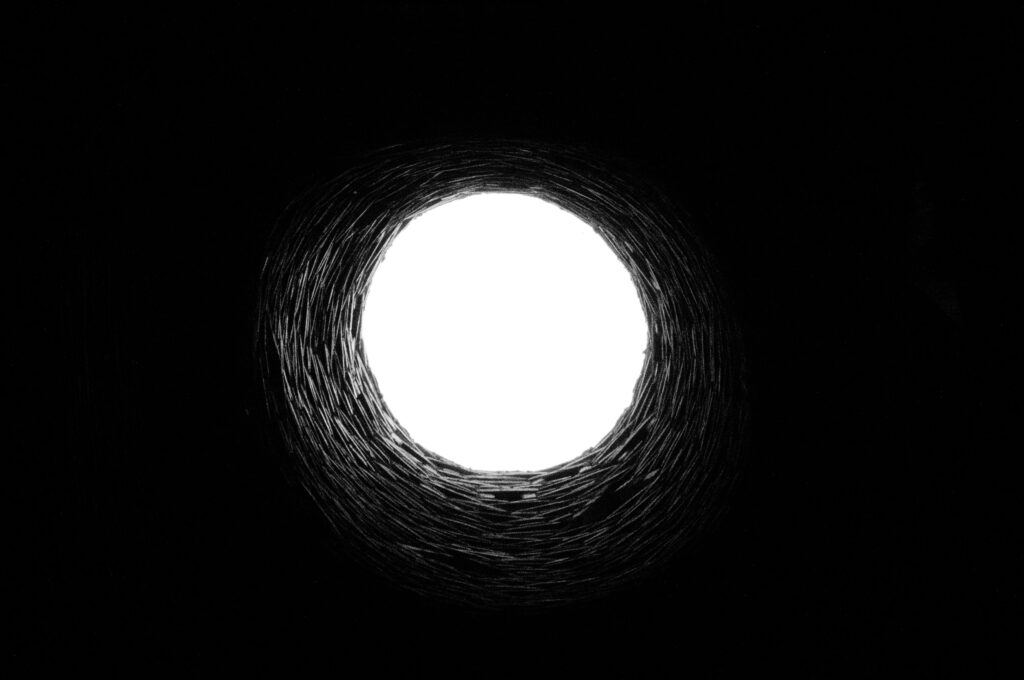 Hole - well looking up Photo by Valentin Lacoste on Unsplash