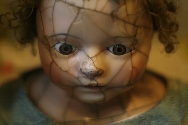 doll broken cracked face Photo by Aimee Vogelsang on Unsplash