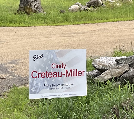 Cindy Creteau-Miller in front of resigned Gunstock Area Commissioner Gary Kiedaish home