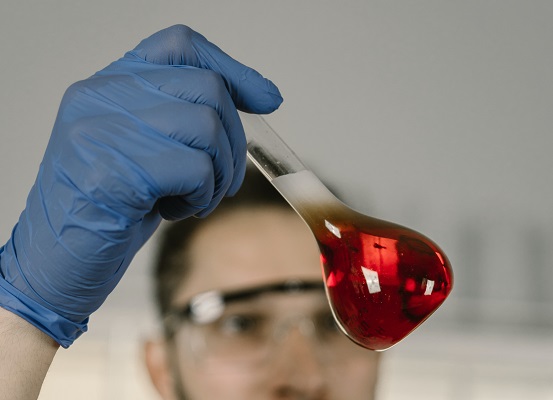 Scientists chemist vial liquid oriringal Photo by Mikhail Nilov httpswww.pexels.comphotoa-man-holding-a-8851636