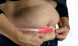 obese fat tape measure waistline