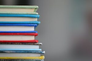 books stacked Photo by Kimberly Farmer on Unsplash