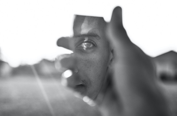 hand mirror face refelction contemplation addiction by Amine M pexels jpeg