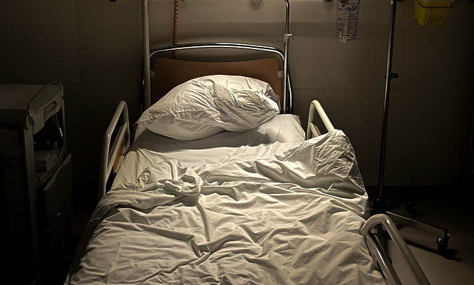 empty hospital bed original Photo by Frederic Köberl on Unsplash